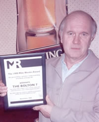 Terry Connell with the Mike Rhodes Award certificate. The award to the Bolton 7 came with Â£1,000 and was 'for their vigorous defence against prosecution under the gross indecency laws'